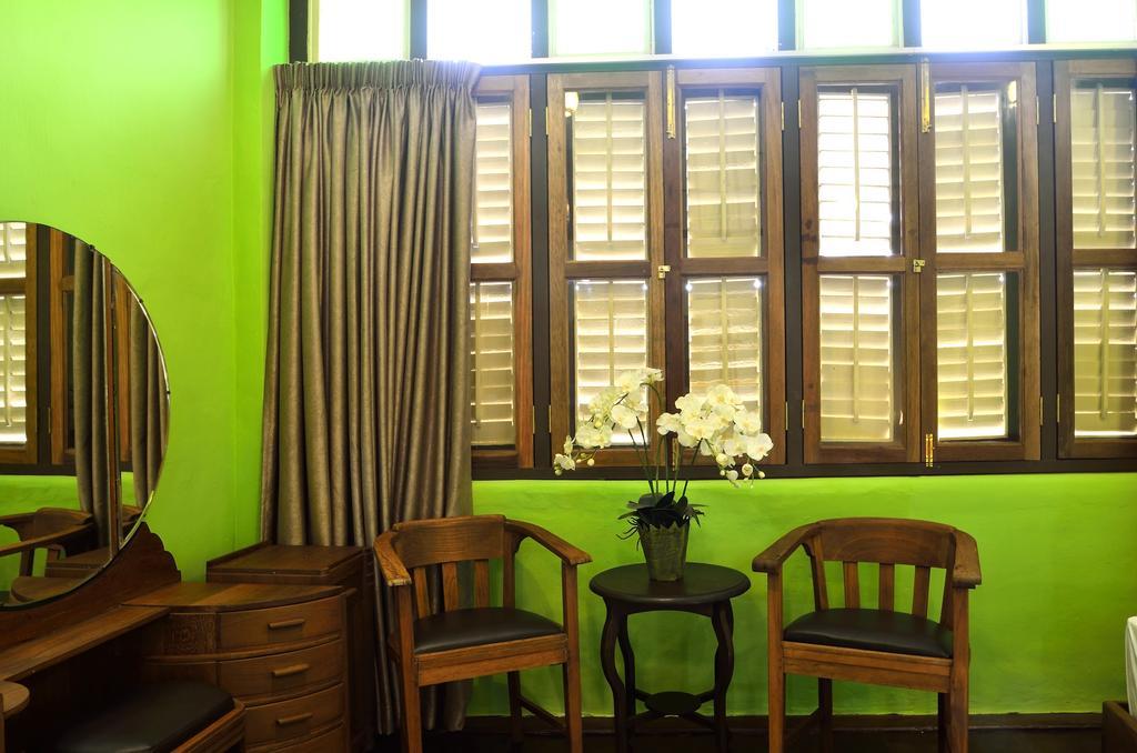 Yong Yi Yuen Guesthouse 乔治敦 客房 照片